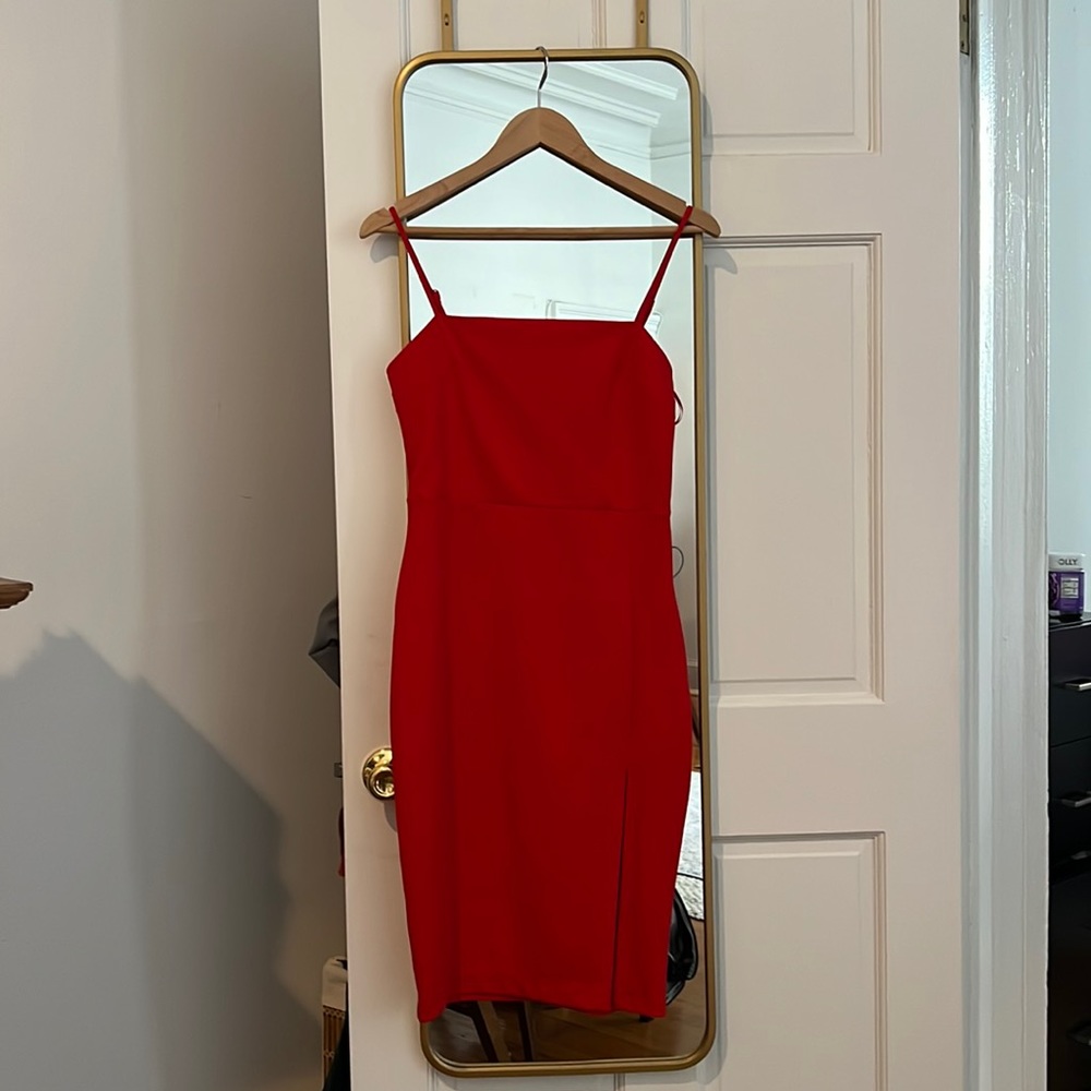 Brand new with tags. Pretty red dress! Size 6.